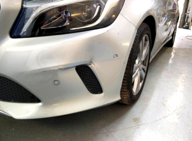 Mercedes A Class with bumper damage at the Paint Wagon